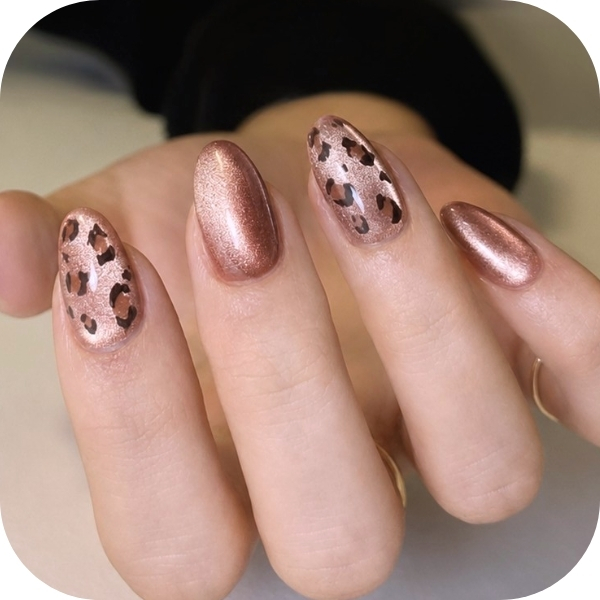 unghie maculate marrone cat eye