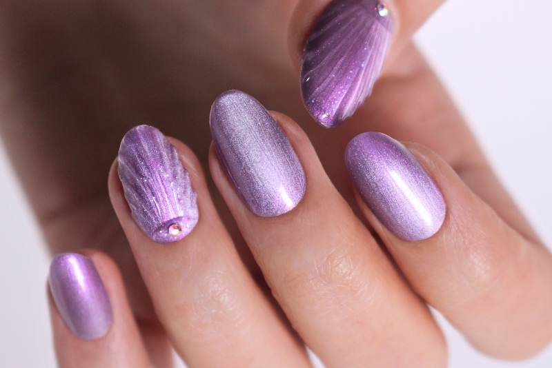 Unghie Cat Eye 2026: n° idee per una manicure magnetica